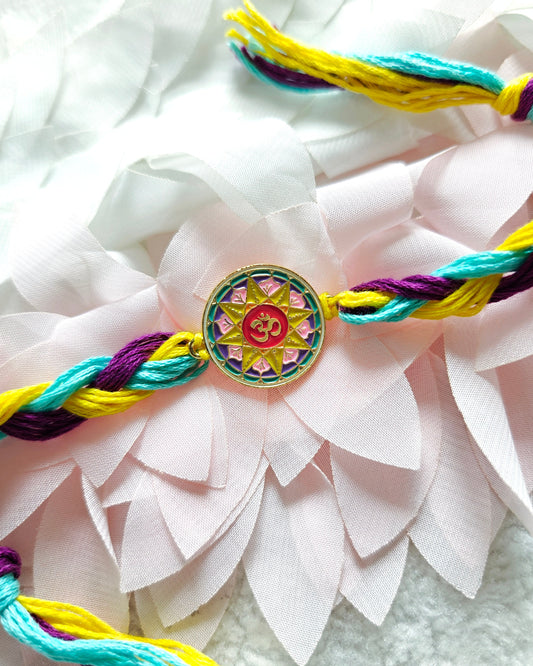 om mandala rakhi with colorful thread spiritual designer rakhi for brother