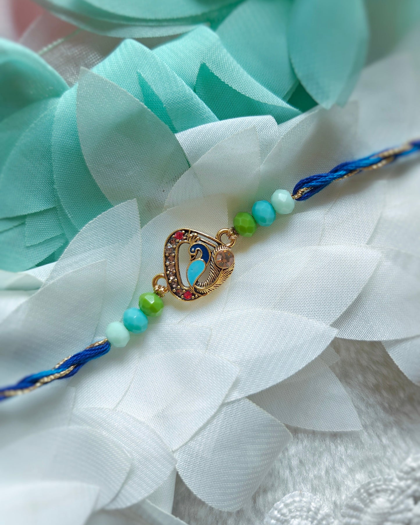 peacock designer rakhi for brother blue green beaded rakhi handmade 2026