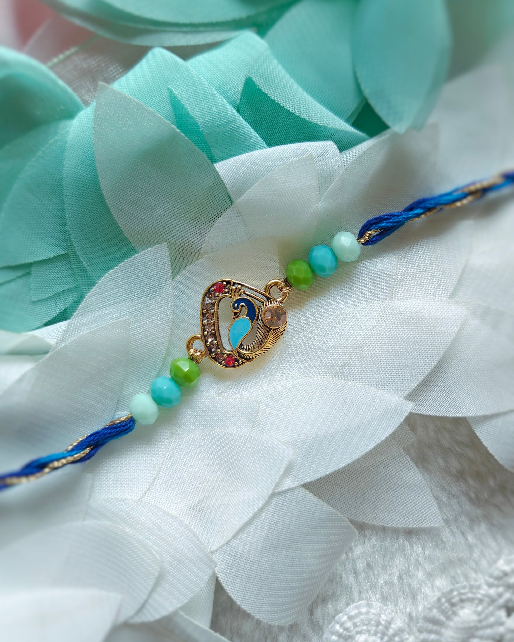 peacock designer rakhi for brother blue green beaded rakhi handmade 2026