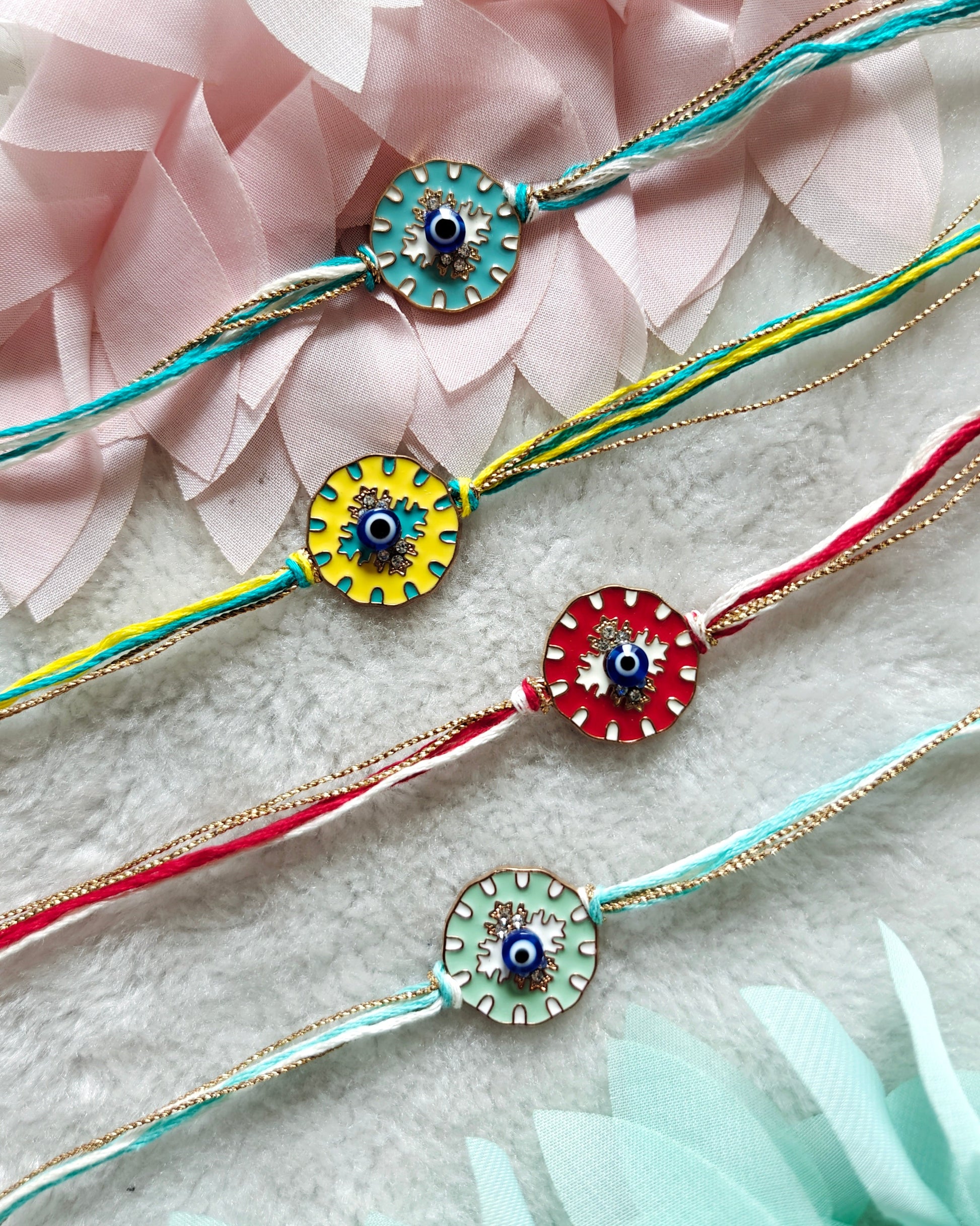 evil eye rakhi for brother colorful minimal nazar rakhi with gold thread detail