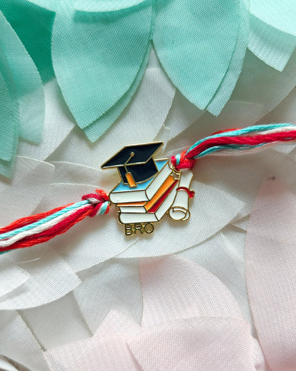 graduation rakhi for brother with books and cap design handmade rakhi 2026