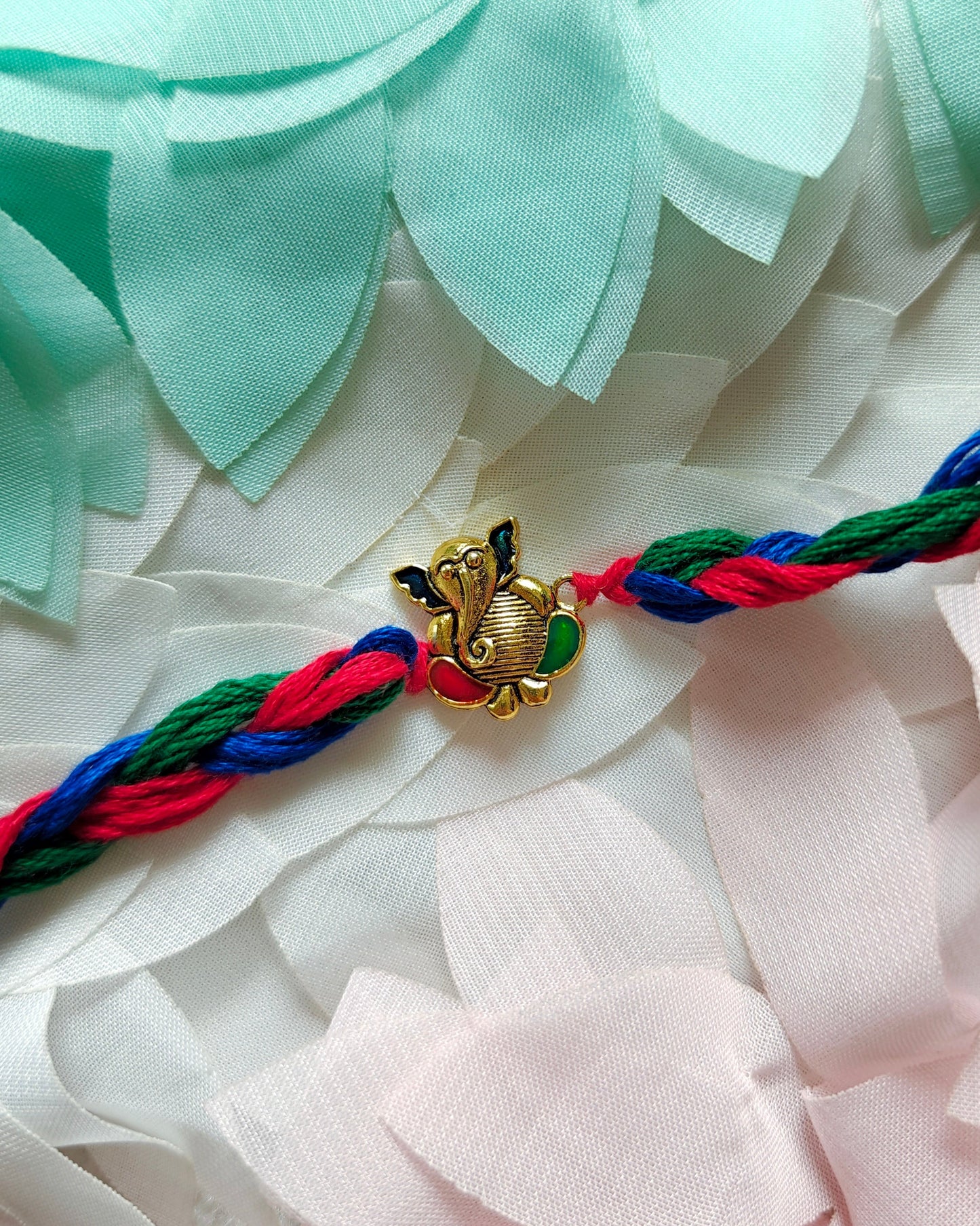 ganesha rakhi for brother handmade multicolor thread rakhi 2026