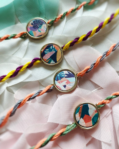 abstract designer rakhi for brother peach grey thread minimal rakhi 2026