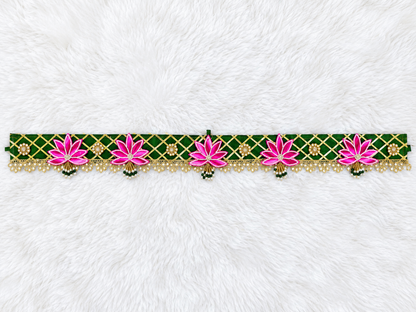 Handmade green festive toran with pink lotus motifs and lace detailing for door décor