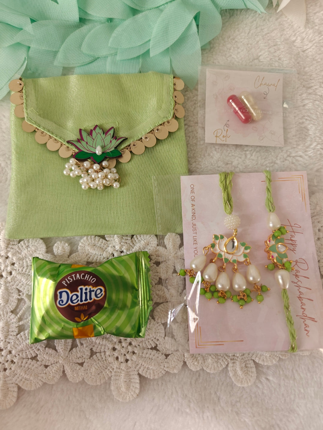 Lotus Grace Rakhi & Lumba Potli Hamper