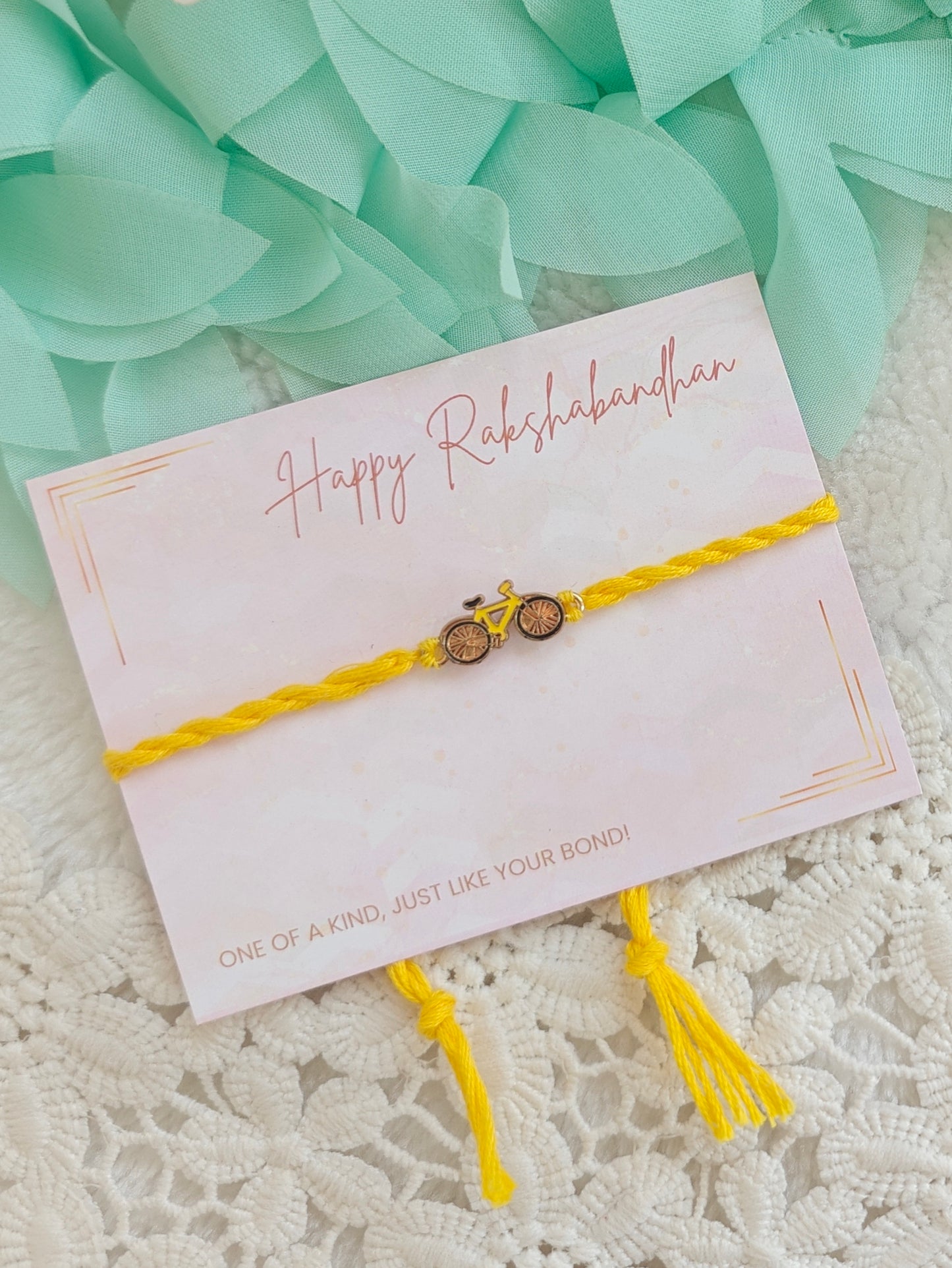 Tiny Cycle Charm Rakhi